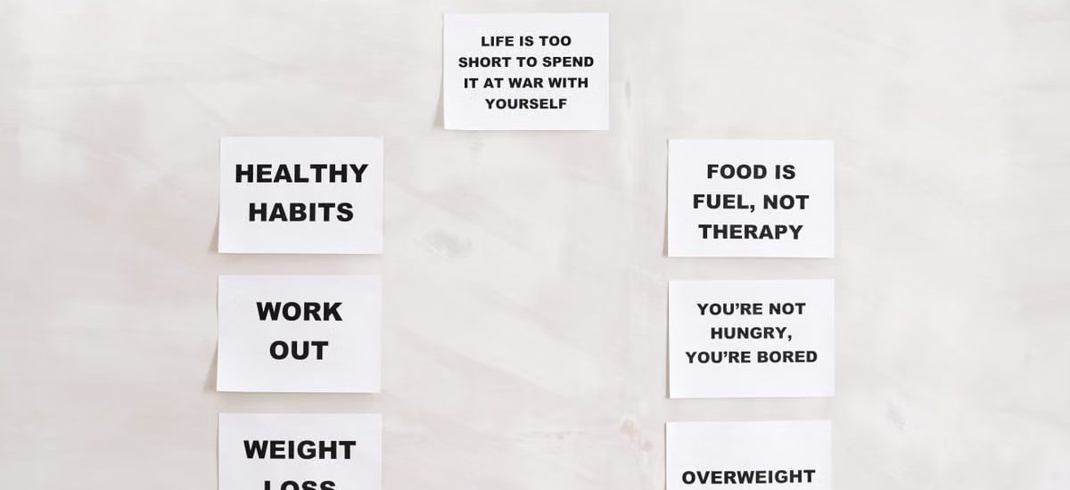 Minimalist display of motivational health and wellness quotes emphasizing healthy habits and weight management.